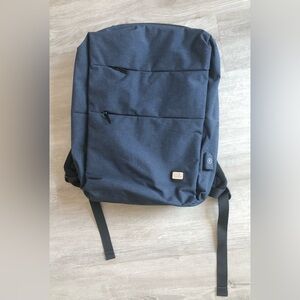 Mark Ryden water resistant anti theft backpack laptop bag with USB charging port